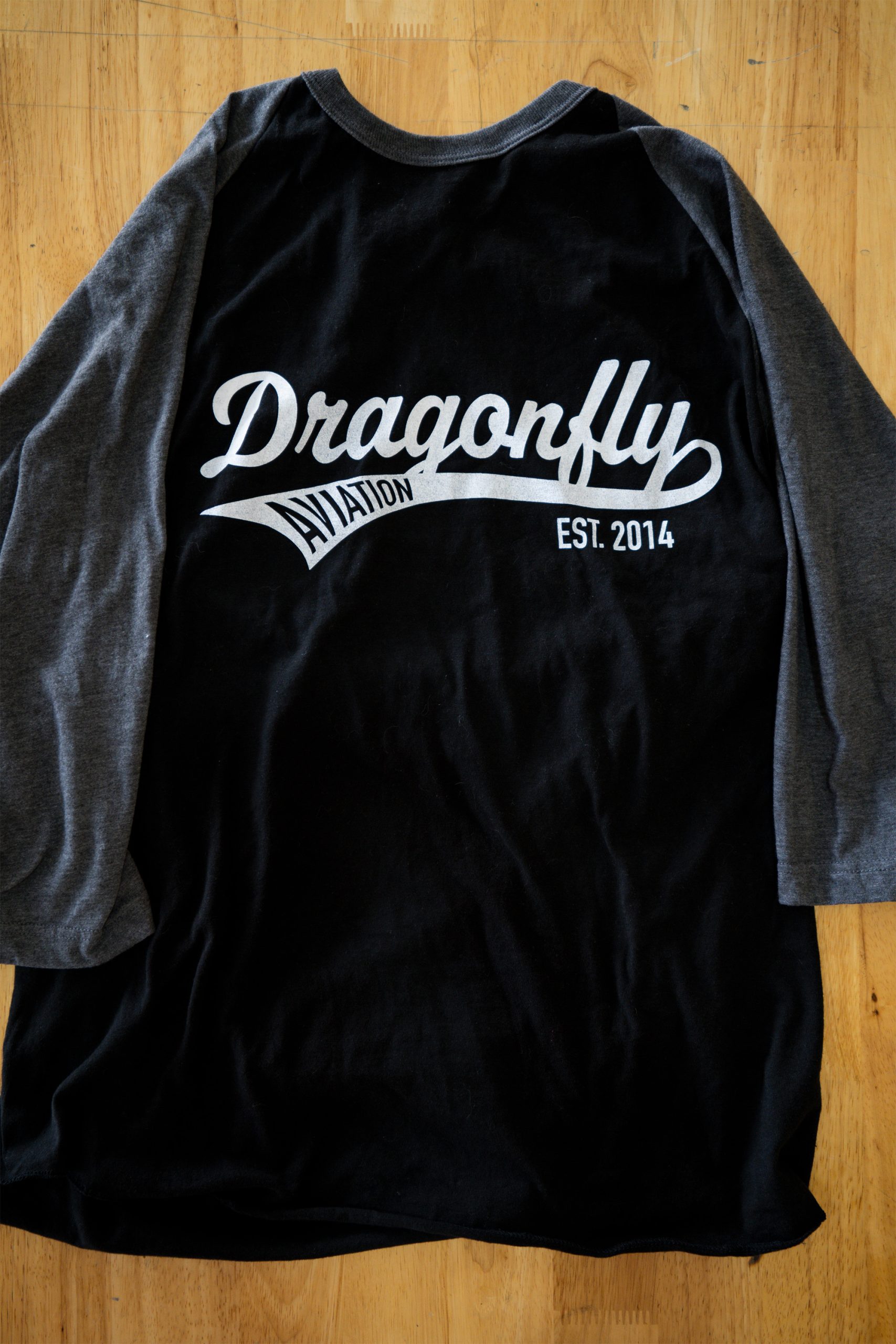 Dragonfly Aviation Raglan Tee Flat Lay